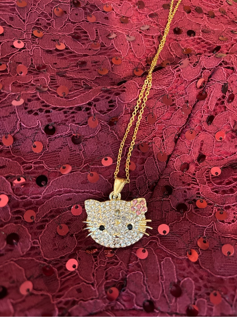 Hello Kitty Gold-tone Crystal Face Pendant with Pink Accents